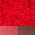 Vibrant red watermelon texture with shades of pink and brown for fresh summer vibes.