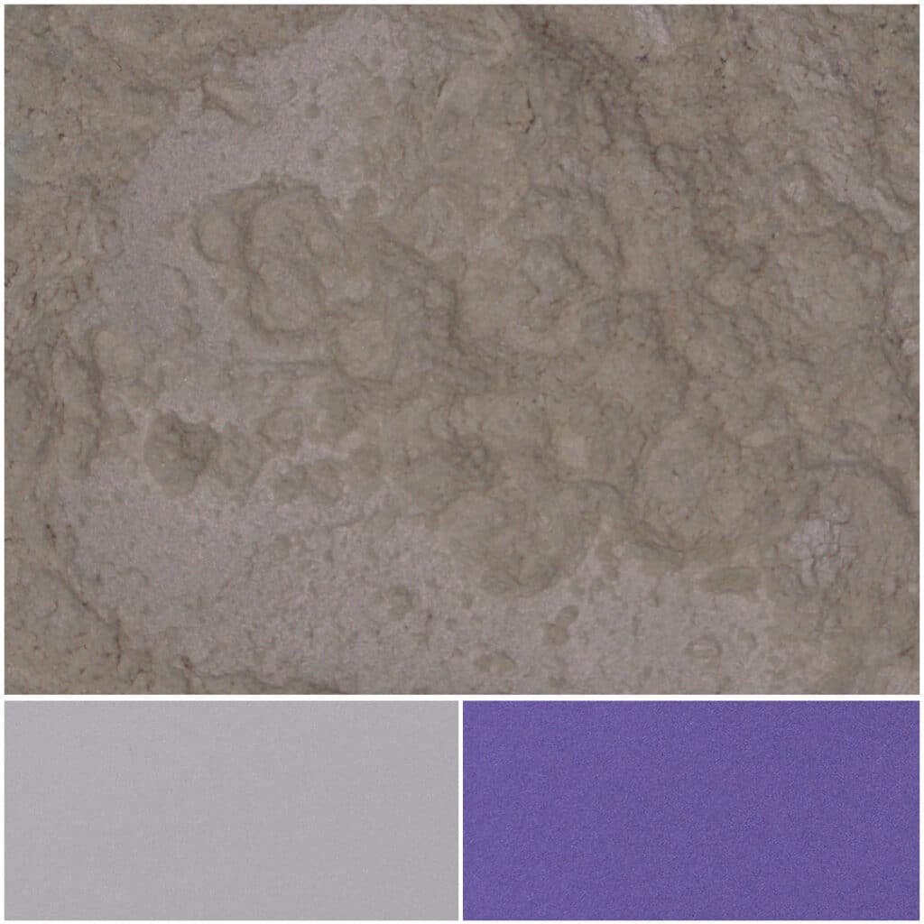 Violet-colored powder samples displayed on a textured surface for analysis.