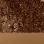 Glossy bronze sachet showcasing rich, metallic hues for elegant packaging and design.