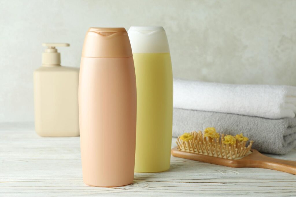 Nourishing shampoo and conditioner set with tools for healthy, revitalized hair care.