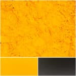 Vibrant yellow mango powder showcasing rich color and texture for culinary uses.