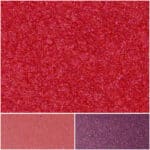 Vibrant red shimmer swatch showcasing Glamour Tropic Red beauty and color richness.